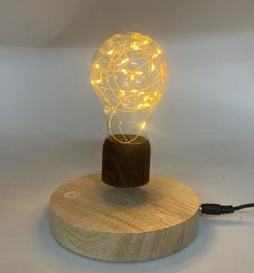 Wholesale round base wireless magnetic levitation desk lamp light night bulb from china suppliers