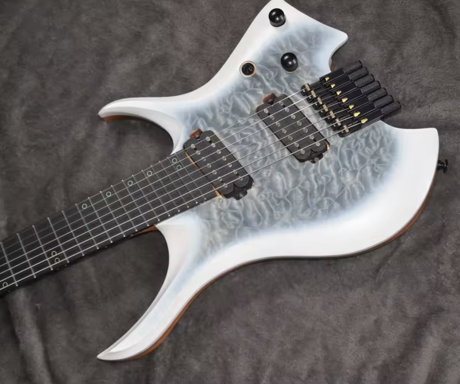 2025 Fanned Frets 7 Strings Headless Electric Guitar White Color with Eye Poplar 5-ply Roasted Maple