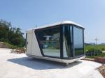Discover the ultimate in mobile living with our Portable Capsule House. This