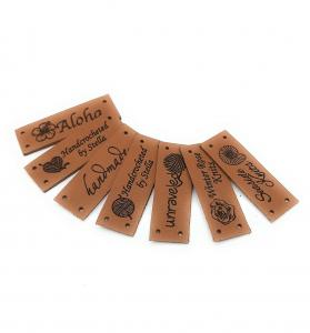 China Embossed Sew On Backing Personalised Leather Craft Labels For Clothing on sale
