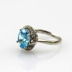 Sterling Silver 8mmx10mm Oval Blue Topaz Cubic Zircon Ring (R182)