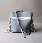 2016 summer new Korean fashion spell color tassel leather handbag drawstring