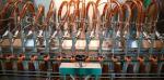 16 Head 4000 BPH Volumetric Liquid Filling Machine Edible Oil Bottle Filling