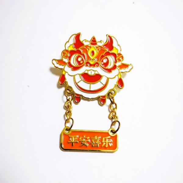 Gold Finishing Stamped Iron Enamel Pins Showcasing Lion Dance Head With Chinese