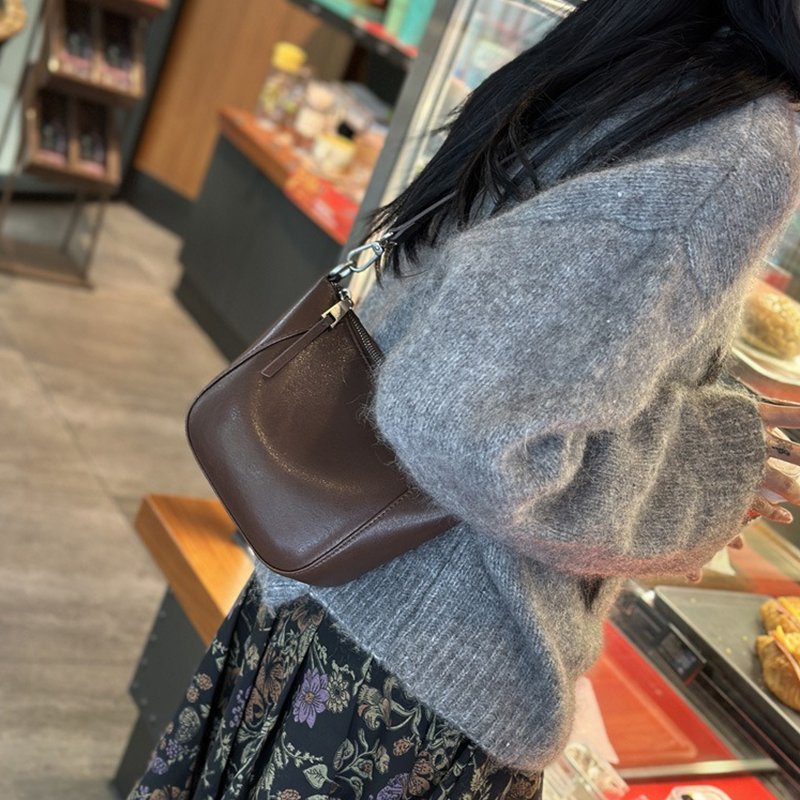 Upgrade Your Wardrobe with 2024 Spring's Flocked Cowhide Bag Versatile and Timeless