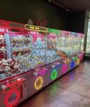 Earn money coin operated fully transparent hardware cabinet doll machines for