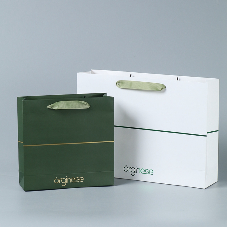 Customized Logo Accepted Ivory Board Paper Bags for Boutique Requirement
