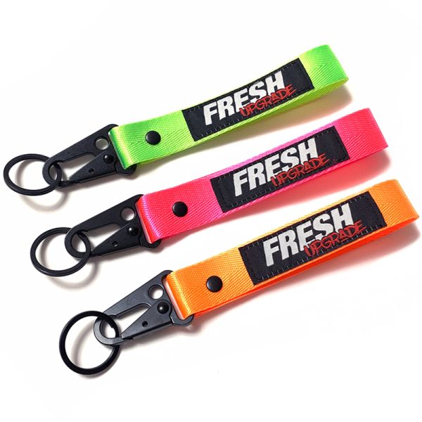 Customizable eco-friendly polyester lanyards with 1.5cm width are perfect for holding mobile phones.