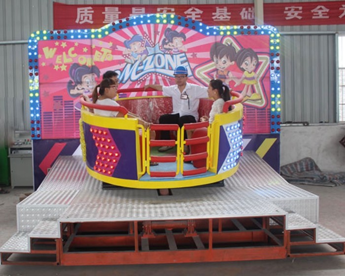 Simple To Operate Crazy Fair Rides , Colorful Led Lights Mini Tagada Disco
