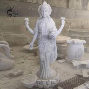 China Lakshmi Marble Statues White Stone Laxmi Sculpture Hindu God Fortune Goddess Indian Religious Hand Carved on sale