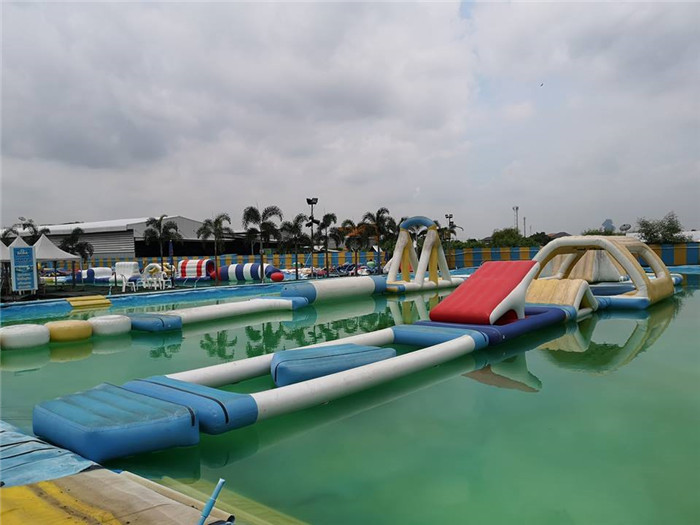 Anti - UV 0.9mm PVC Tarpaulin Inflatable Water Obstacle Course For Lake