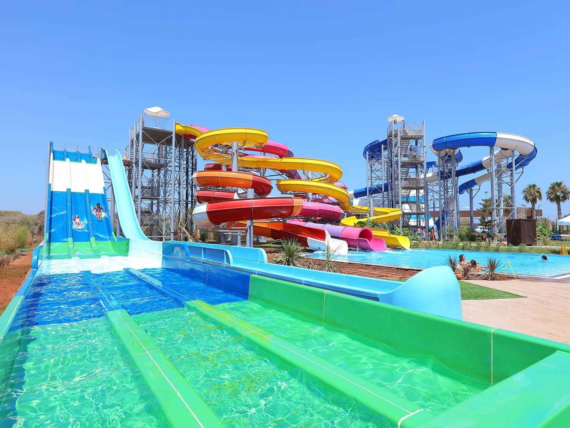ODM Outdoor Large Water Amusement Park Summer Swimming Pool Fiberglass Rainbow Slide For Children