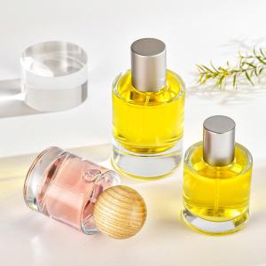 Wholesale Perfume Glass Bottle 30ml 50ml Bayonet Cylinder Transparent Perfume Subpackage Cosmetics Spray Bottle With Wooden Cover from china suppliers