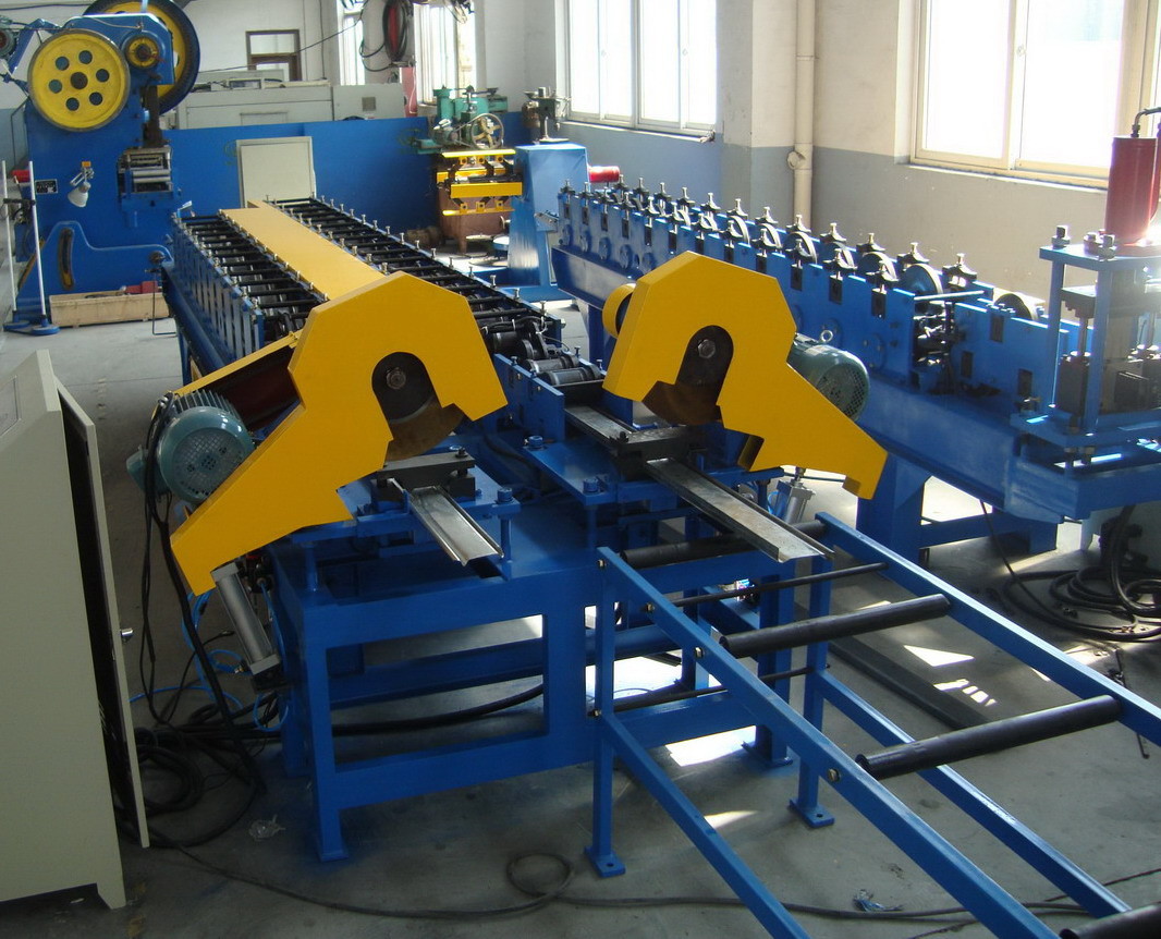Steel Sheet Roller Shutter Door Roll Forming Machine With PLC Control System​