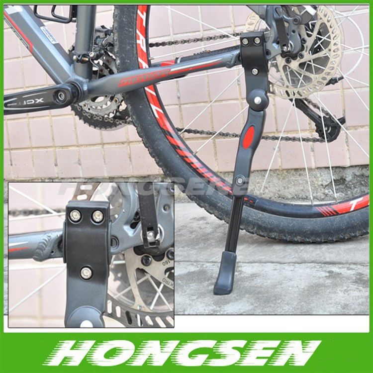 Black and white adjustable mountain bicycle foot support/kickstand