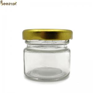 Wholesale 25ml glass honey jars bulk Empty Storage Glass Jar Glass Honey Bottles from china suppliers