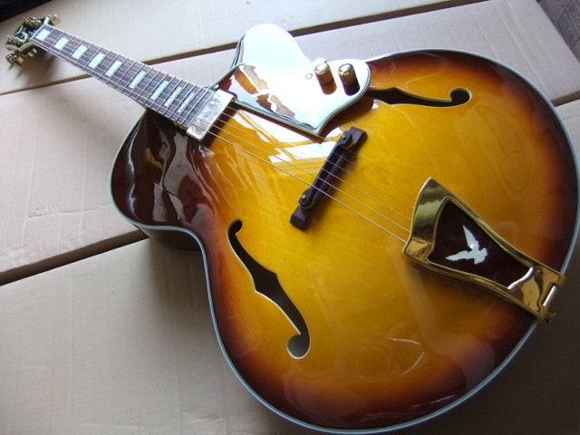 Wholesale New Rare Jazz Electric Guitar L-5 Model With Flower Pickuguard and Tailpiece and Headstock In Sunburst