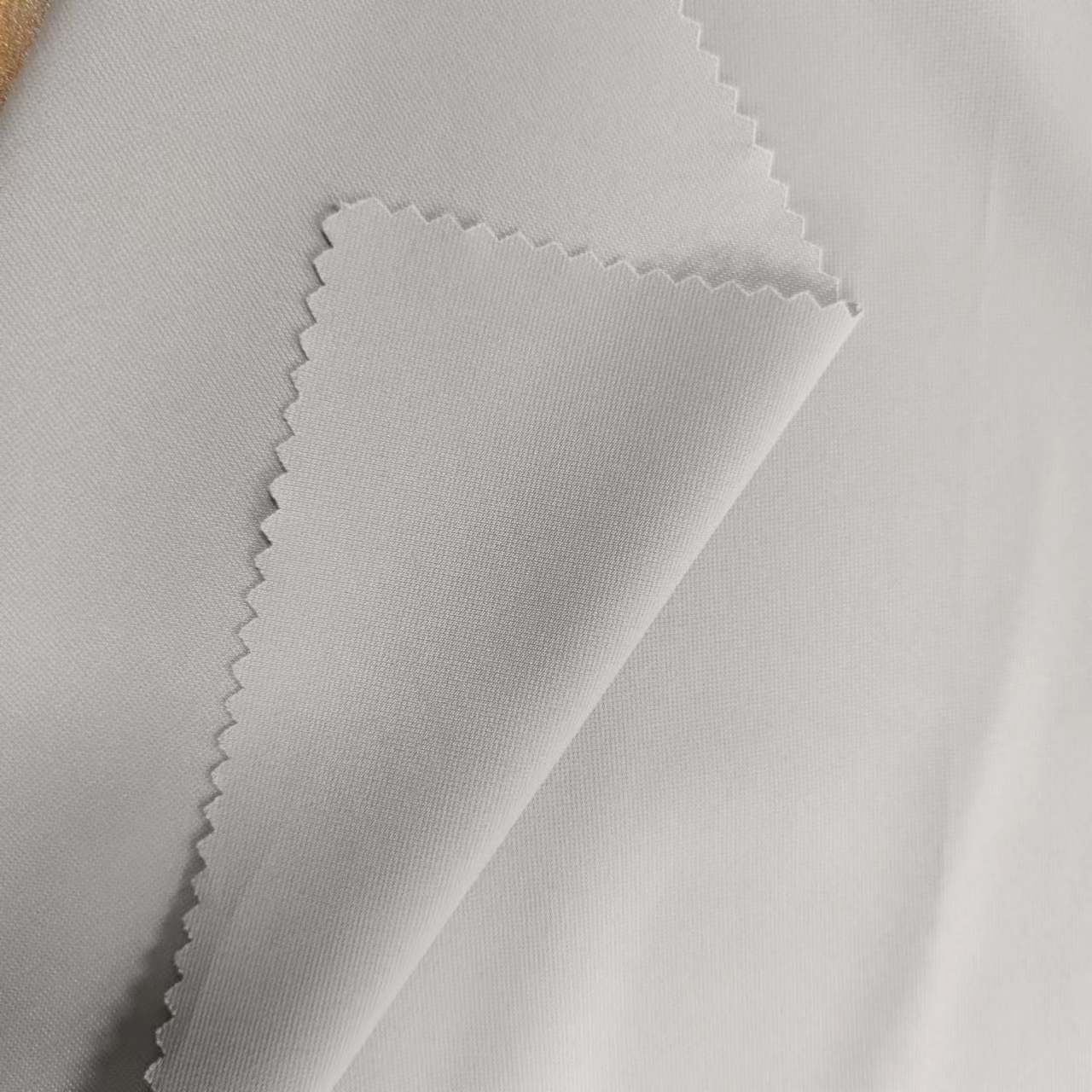90% Polyester 10% Spandex Fabric Small Ripstop Grey Weft Woven 155G Sportswear