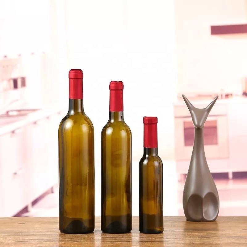 Custom design 750 ml high white glass wine bottle with frosted finish and round shape