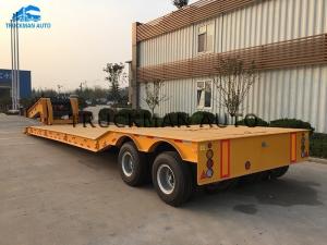 Wholesale 2 Axles Low Bed Semi Trailer 20-40 Tons Machine Loading Spring Steel Suspension from china suppliers