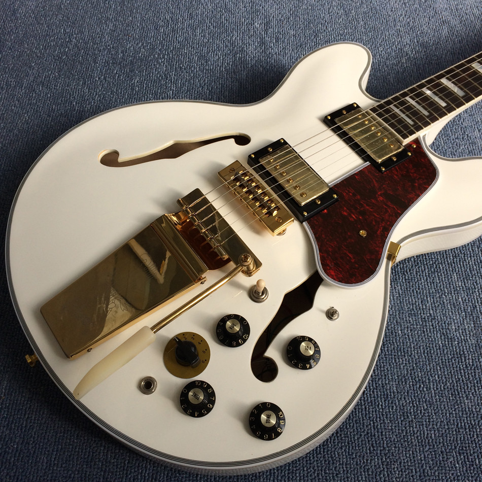 Hollow body jazz electric guitar, Double F holes,Ebony Fingerboard,Tremolo system,white guitar