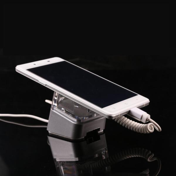 COMER anti-theft security display for smartphone stands in mobile phone