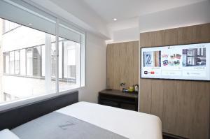 Wholesale Bangkok hotel style apartment saving space furniture by Laminated wall panel Bed headboard with writing desk and Wardrob from china suppliers