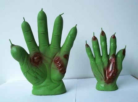 Green Devil's hand unscented candle packed into clear gift box