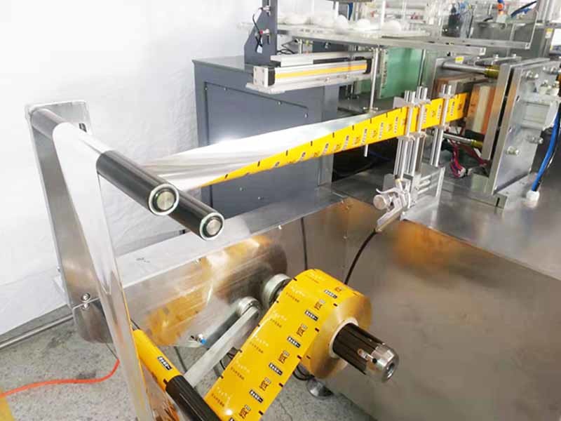 AC220V PE Glove Folding Packing Machine Multifunctional Four Side Sealing