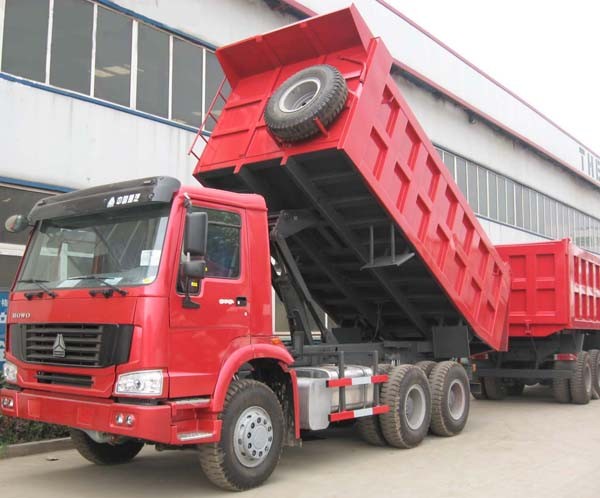 Howo A7 diesel tipper dump truck A7W cabin with 12R20 tires red color and heavy end tipping