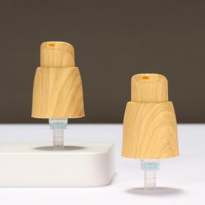 Wholesale Outer Spring Airless 0.25cc Plastic Lotion Pump Hand Lotion Pump With Wood Grain from china suppliers