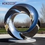 Large outdoor park shaped twisted ring stainless steel sculpture