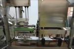 Automatic High Speed Glass Bottle Metal Cap Twist Off Vacuum Capping Machine