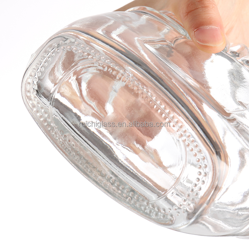 Hot stamping surface handling enhances the beauty of transparent emboss glass bottle
