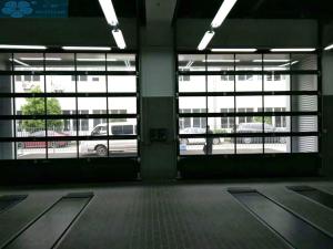 Wholesale Transparent PC Glass Commercial Sectional Garage Doors from china suppliers