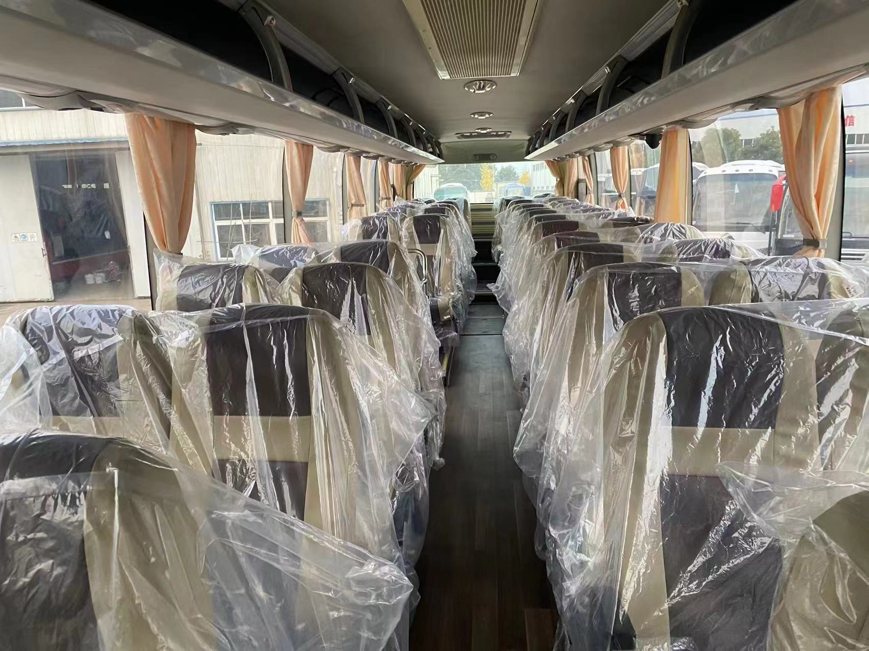 Get Your Hands on a 6122 50-65 Seats Coach Bus with Bathrooms Curb Weight 18000kg