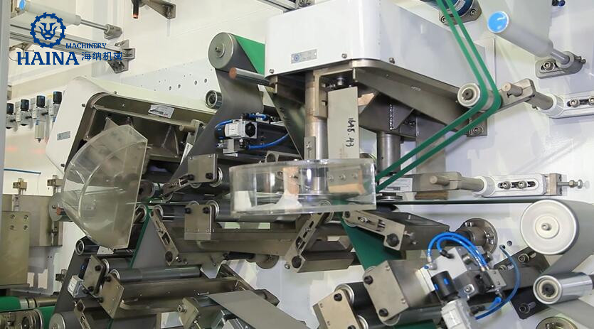 HAINA 250KW 97% Passing T Shape Elastic Ear Diaper Manufacturing Machine
