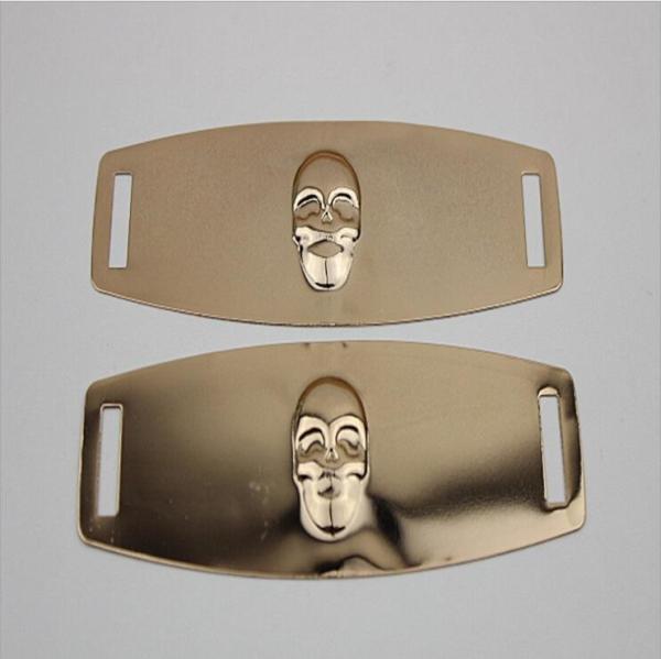 Eco-friendly plating iron sheets gold color embossed skull logo shoe metal