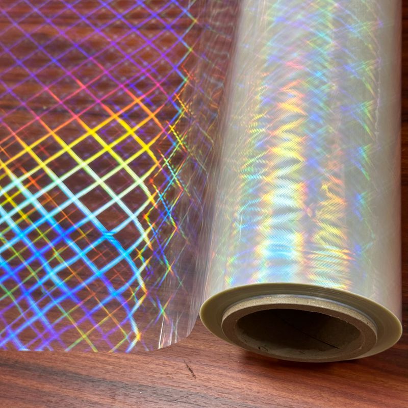 Multiple Extrusion Transparent Holographic Film For Soft Holographic Packing