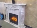 White marble fireplace mantel