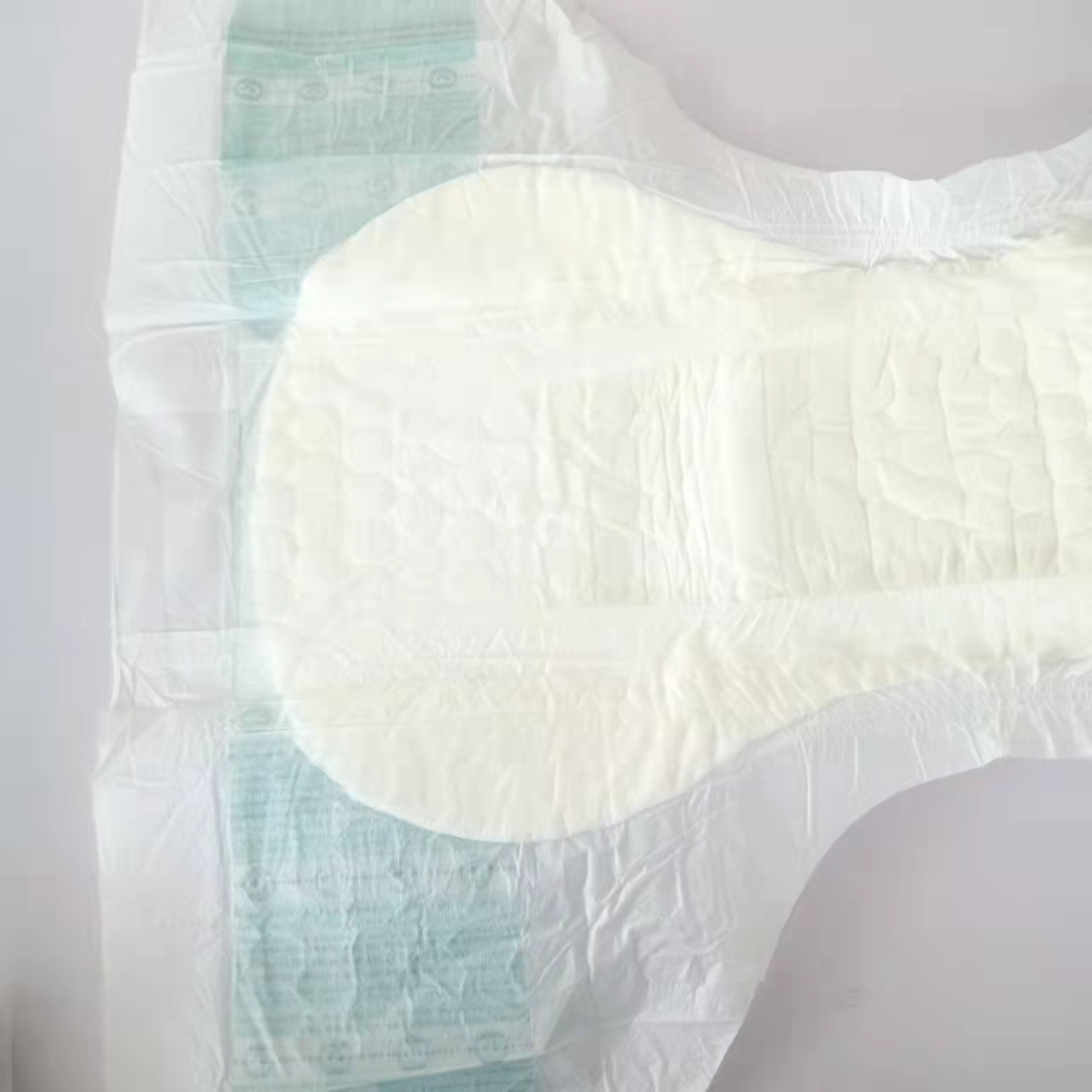 High Absorbency Incontinence Adult Diaper in White Material with Japan SAP