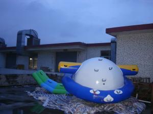 Wholesale Best Selling 0.6mm Pvc Tarpaulin Inflatable Water Saturn Rocker For Water Games from china suppliers
