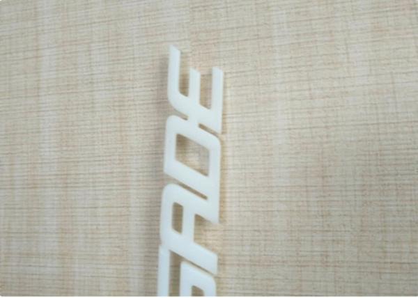 White / Ivory Automotive Plastic Injection Molding Custom Vehicle Logos Sub Gate