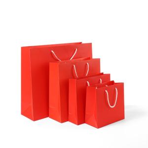 Wholesale Different sizes pure red your logo printed cotton rope handel clothes paper bag from china suppliers