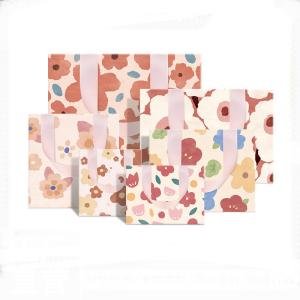 Wholesale High End Oli Printing Flowers Style Cosmetic Clothing Shopping Paper Gift Packaging Bag with Logos from china suppliers
