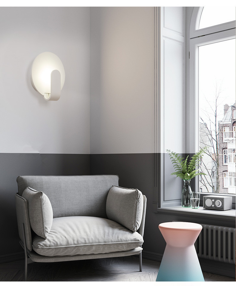 Modern simple and creative bedroom bedroom iron art wall lamp.