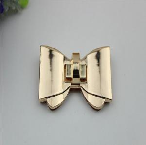 Wholesale High polish gold metal bow-knot pattern zinc alloy fashion twist turn locks for purse from china suppliers