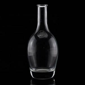 China Acid Etch Surface Handling Tequila Glass Bottles with Round Neck and Empty Flint on sale