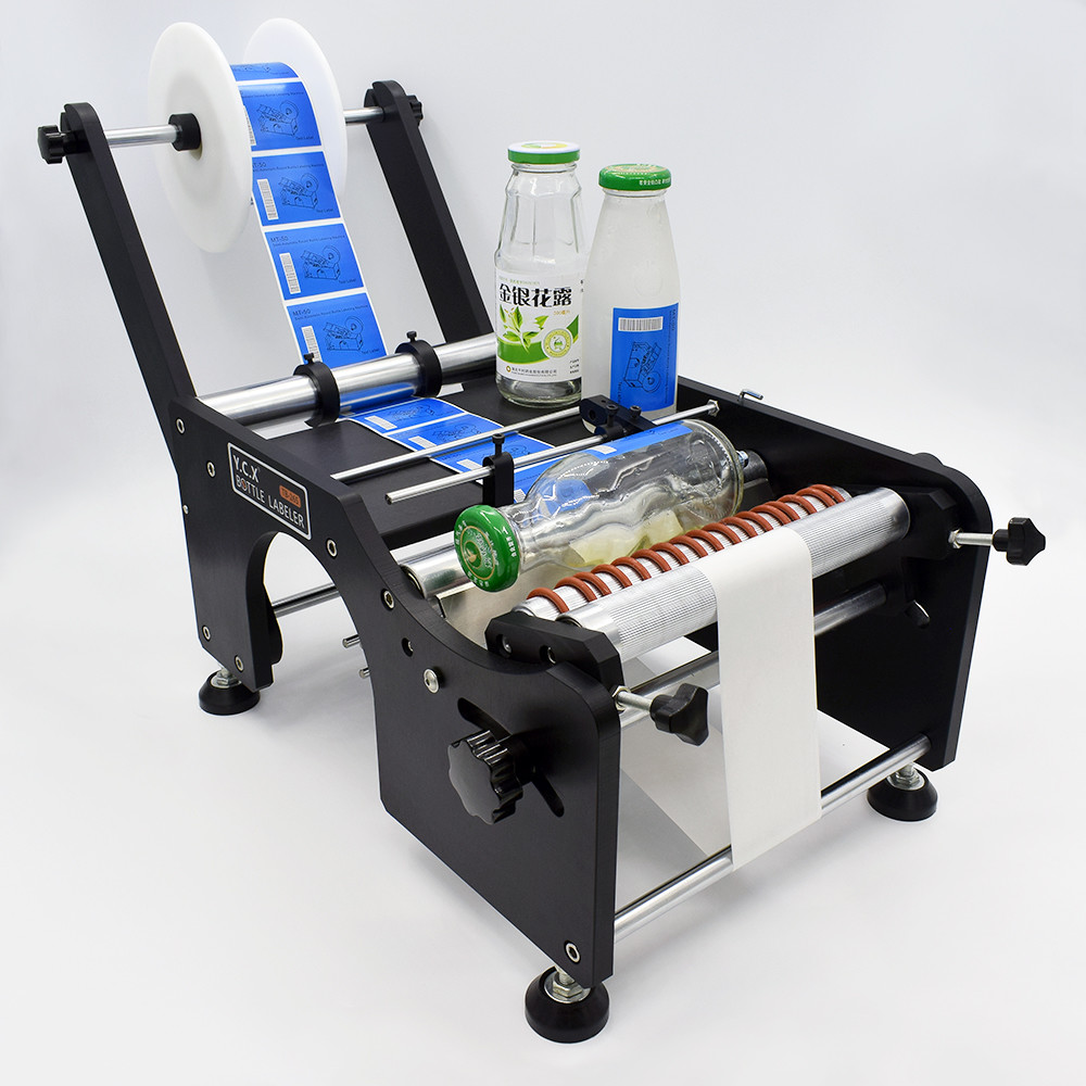 YCX Manual round bottle sticker label machine small labeller bottle dispenser TB-26S