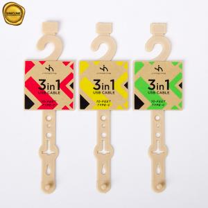 China Paper Sticker Printed Beige Plastic Belt Hangers With Tail on sale